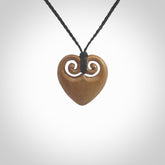 Hand carved heart pendant. Hand made from woolly mammoth tusk. Hand made jewellery for sale online. Rare and unique handmade jewellery. Made by NZ Pacific.